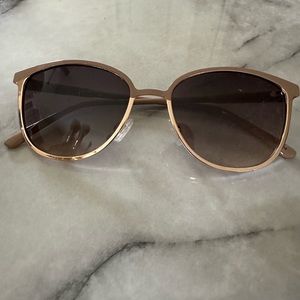Tan and gold sunglasses